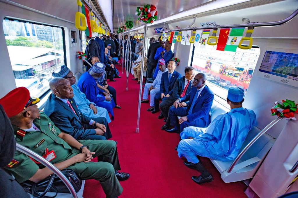 Buhari Inaugurates Lagos Blue Rail Line, Takes Train Ride