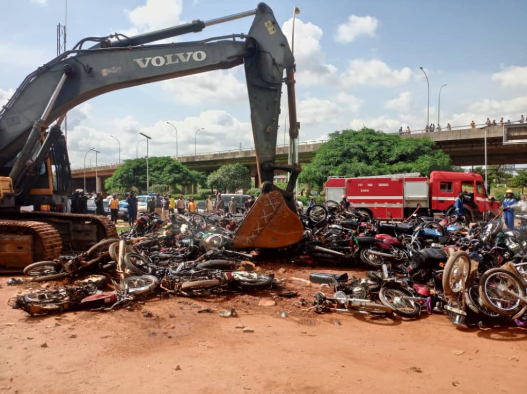 FCTA impounds, crushes 400 commercial motorcycles in Abuja FCTA-crushes-motorcycles