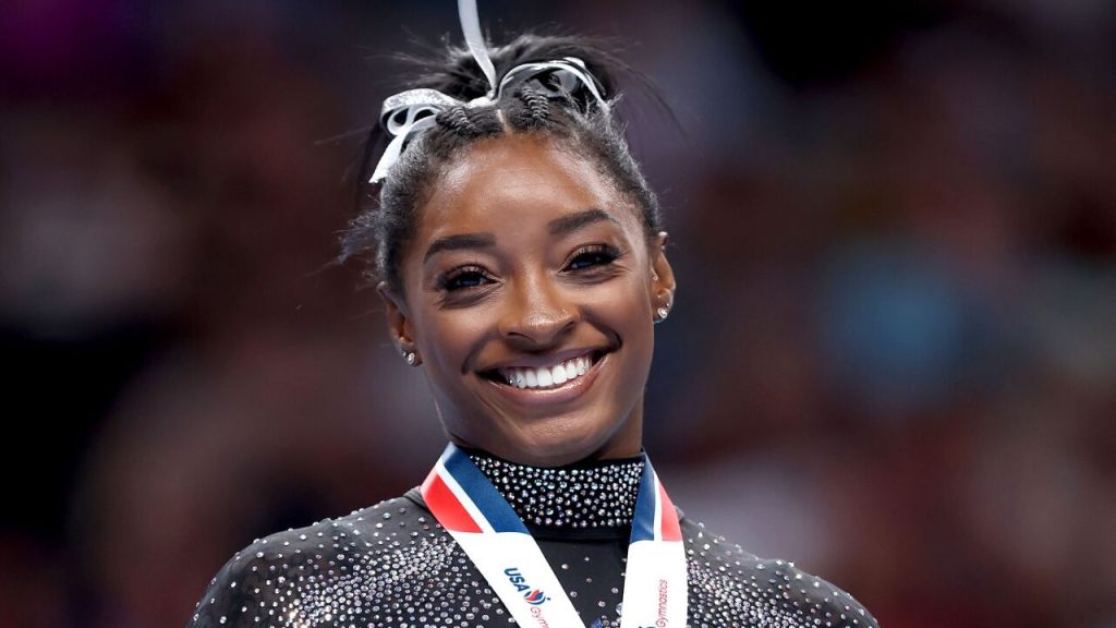 Biles takes silver as Andrade wins floor gold